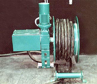 Detail of motor driven cable reels for power supplying of stage trolleys in a theatre