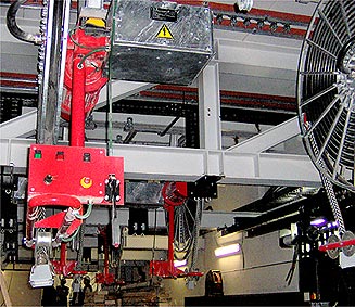 Detail of cable reels lines driven with motor in a theatre, assembly on running frames with local control box of the reels
